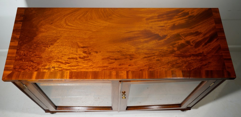 Finely figured Mahogany two door glazed cabinet in excellent restored condition View II