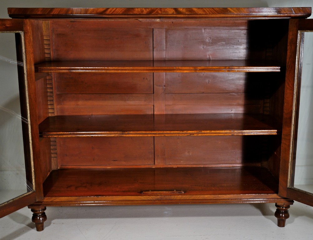 Finely figured Mahogany two door glazed cabinet in excellent restored condition View III