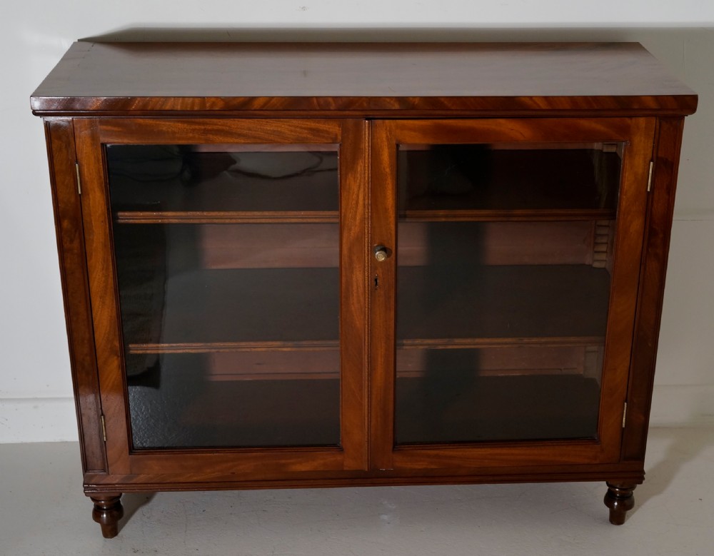 Finely figured Mahogany two door glazed cabinet in excellent restored condition View VII