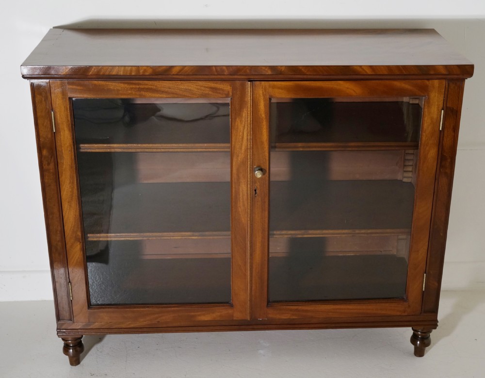 Finely figured Mahogany two door glazed cabinet in excellent restored condition
