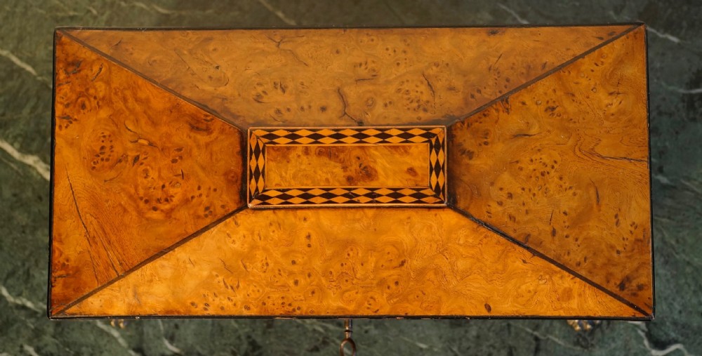 A fine 1820s Pollard oak and inlaid tea caddy supported View IV