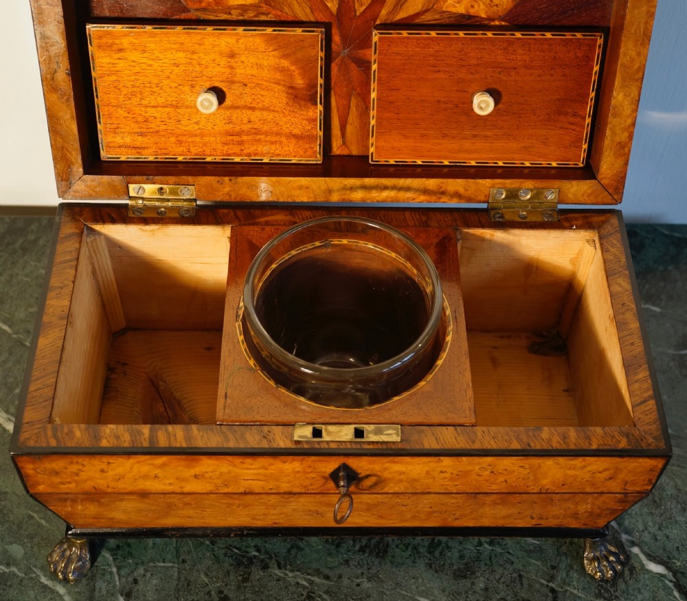 A fine 1820s Pollard oak and inlaid tea caddy supported View VI