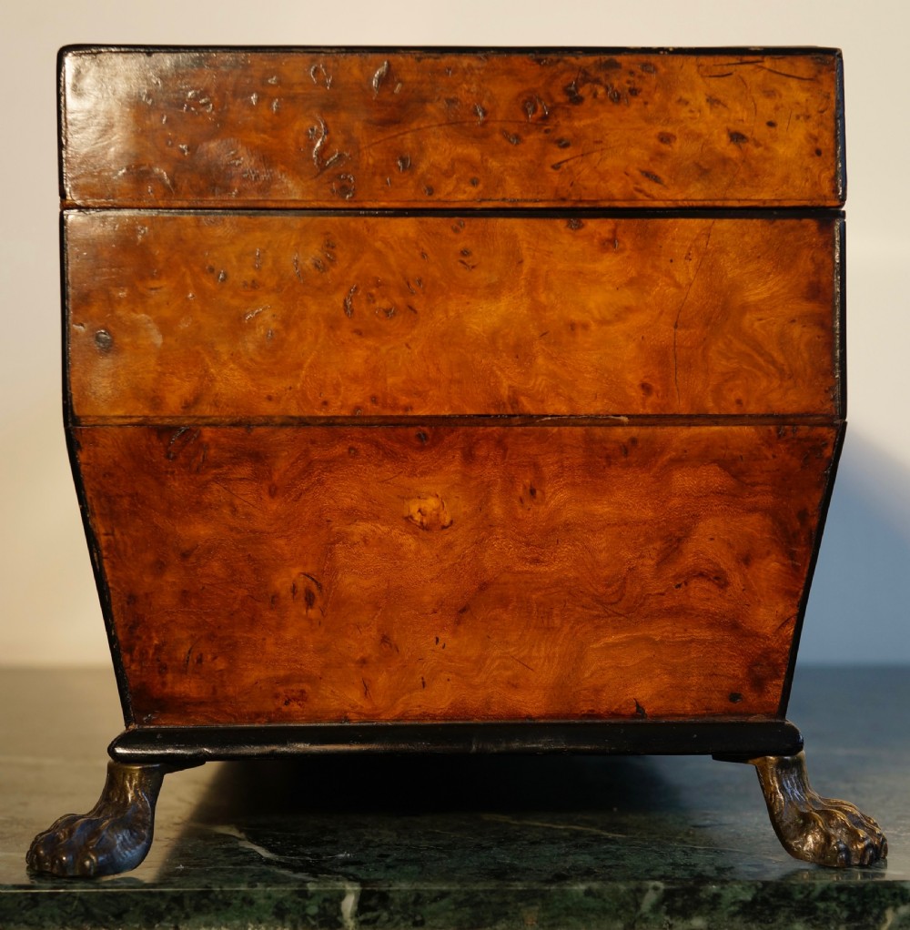 A fine 1820s Pollard oak and inlaid tea caddy supported View IX