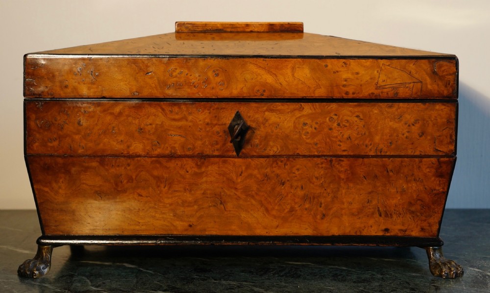A fine 1820s Pollard oak and inlaid tea caddy supported View X