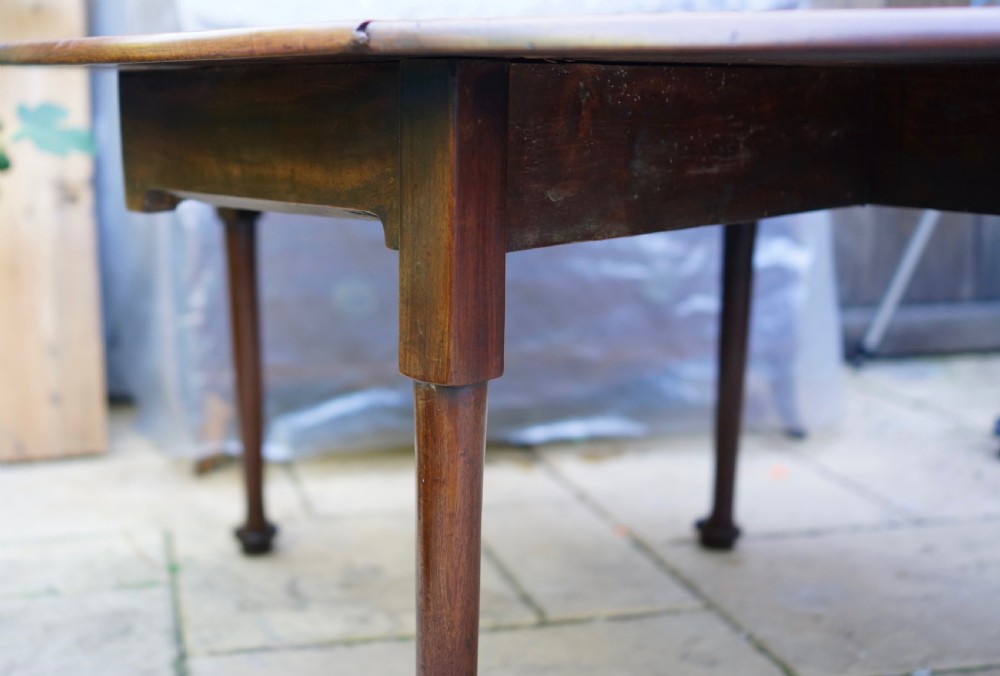                                                      Mahogany oval pad foot dining table Circa 1800 with bold pad foot View IV