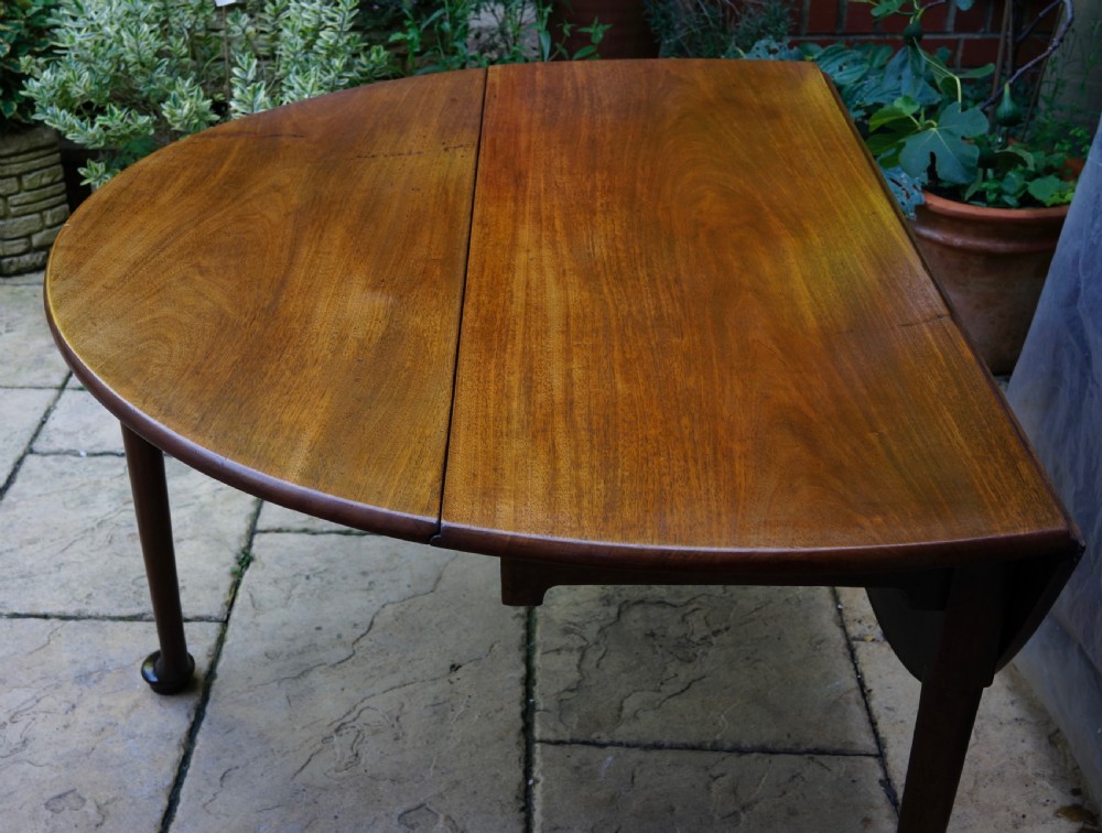                                                      Mahogany oval pad foot dining table Circa 1800 with bold pad foot View VII