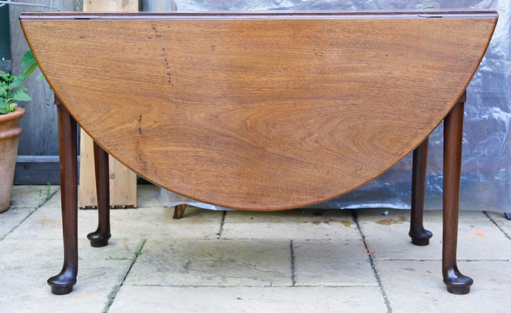                                                      Mahogany oval pad foot dining table Circa 1800 with bold pad foot View IX