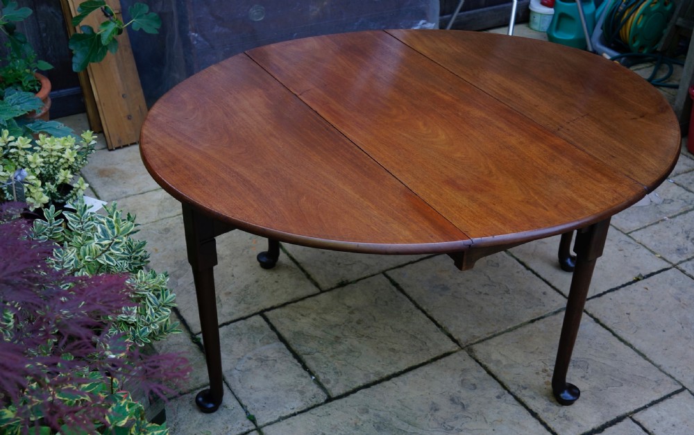                                                      Mahogany oval pad foot dining table Circa 1800 with bold pad foot View X