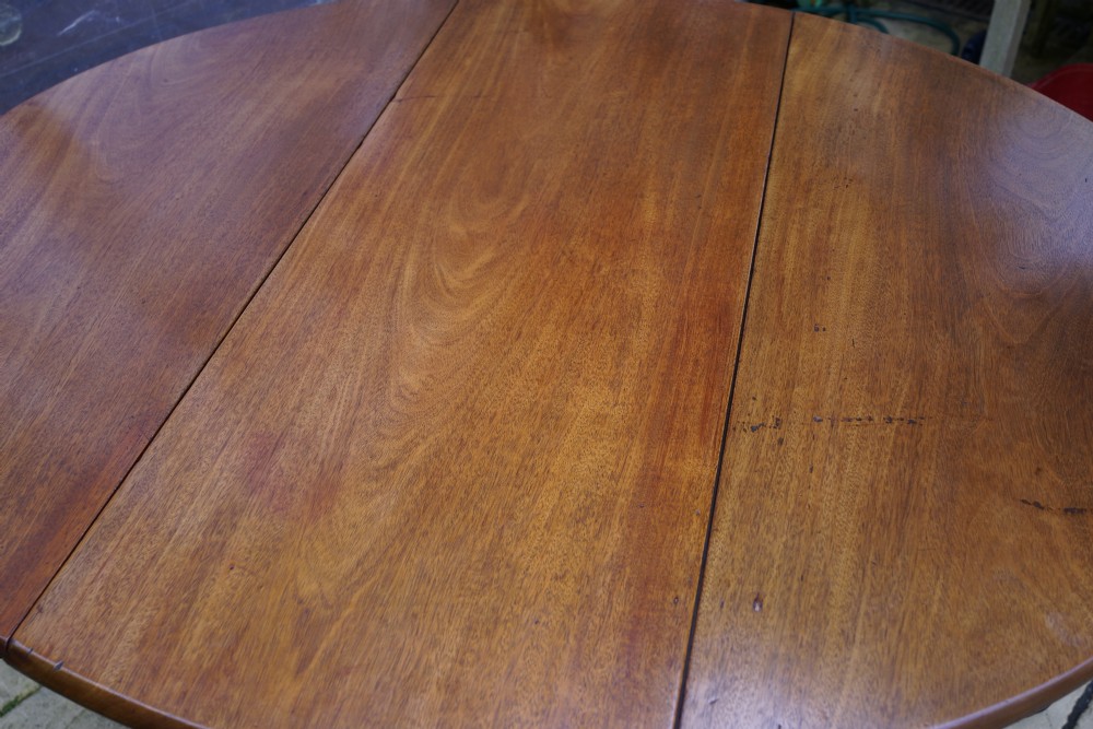                                                      Mahogany oval pad foot dining table Circa 1800 with bold pad foot View XI