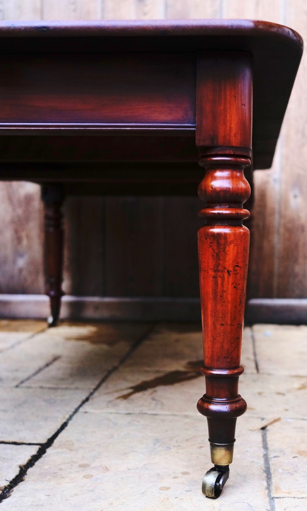 Solid Mahogany extending dining table. View II