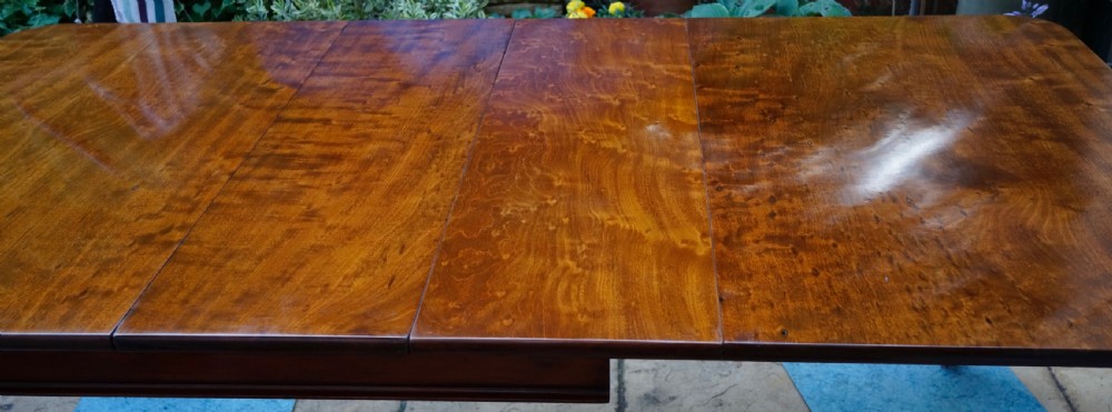 Solid Mahogany extending dining table. View VII