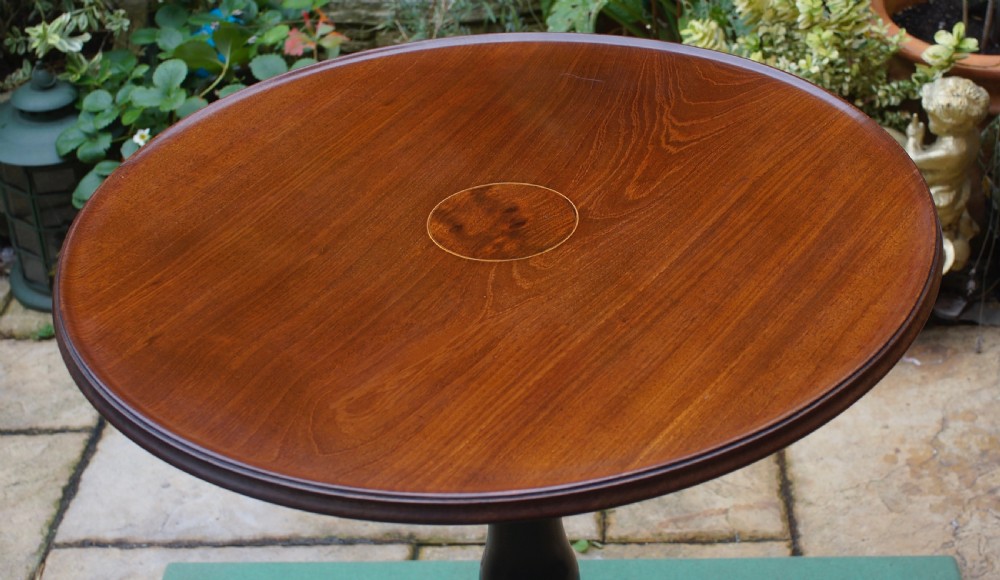 A good Georgian mahogany tilt top dished topped tripod table. View IV