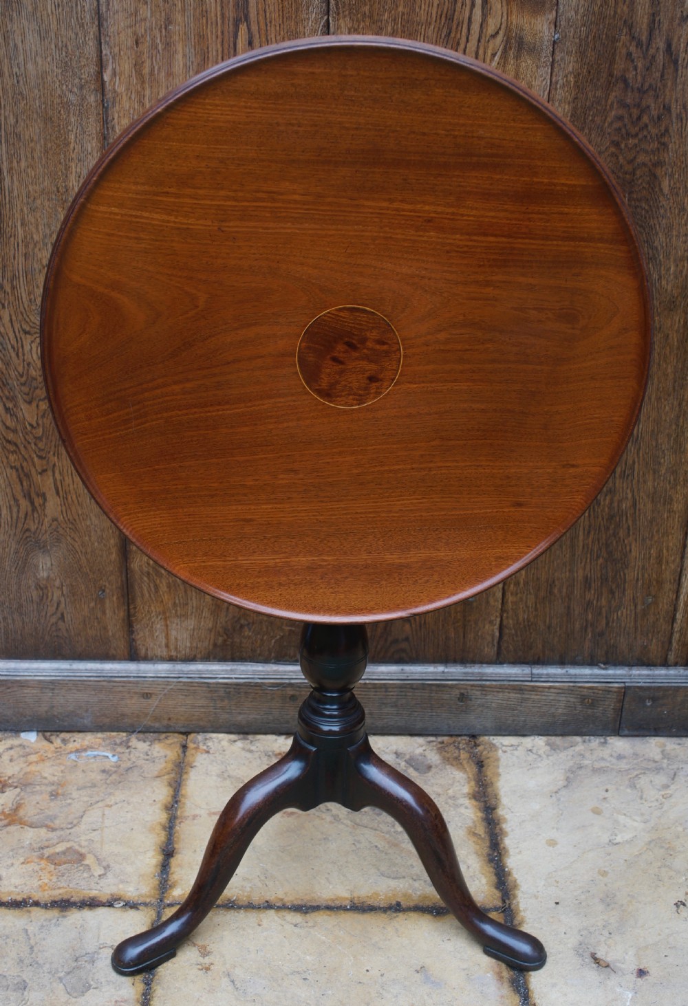 A good Georgian mahogany tilt top dished topped tripod table. View V