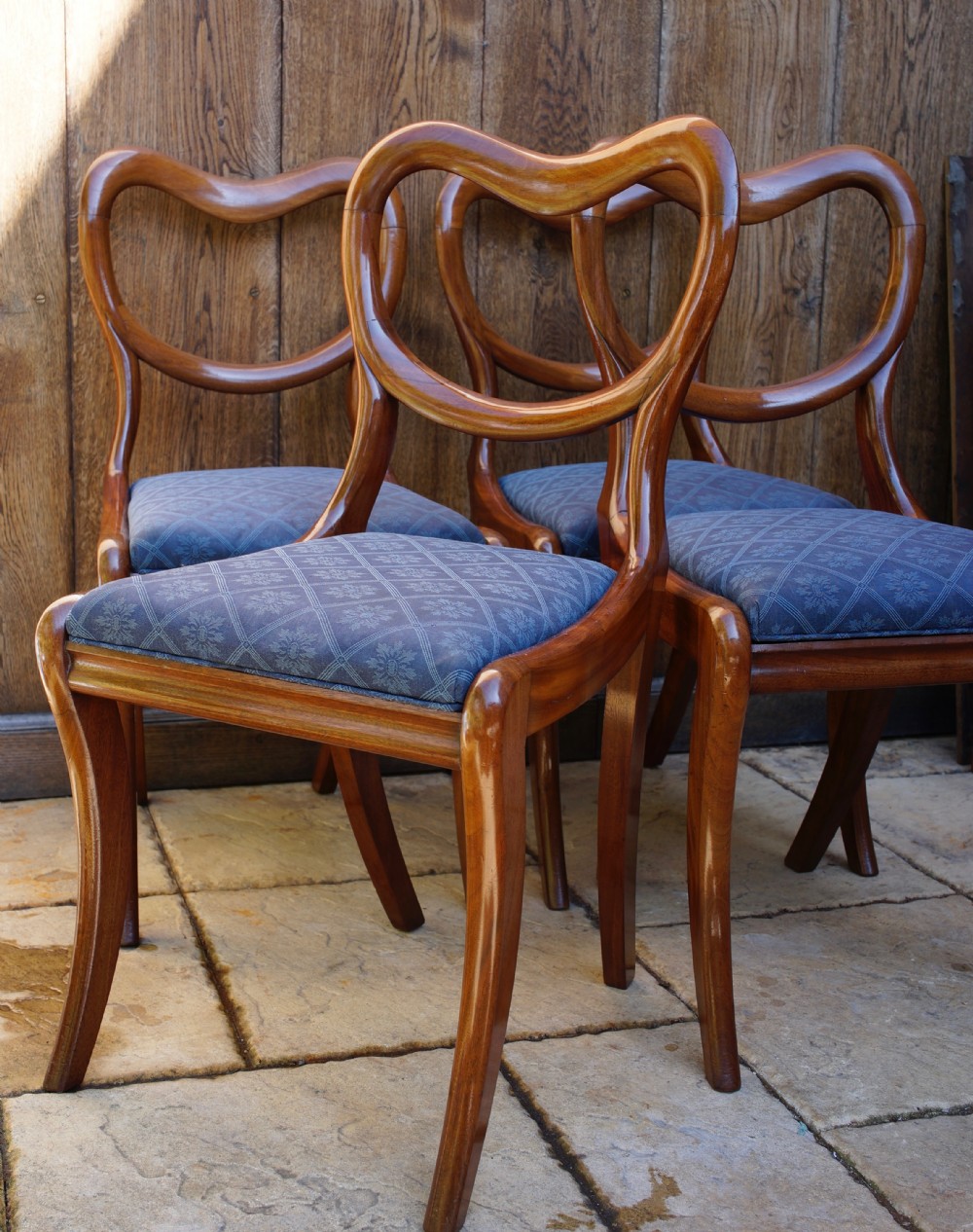 Set of 4 1830s solid mahogany sabre legged dining chairs with kidney shaped backs. View III