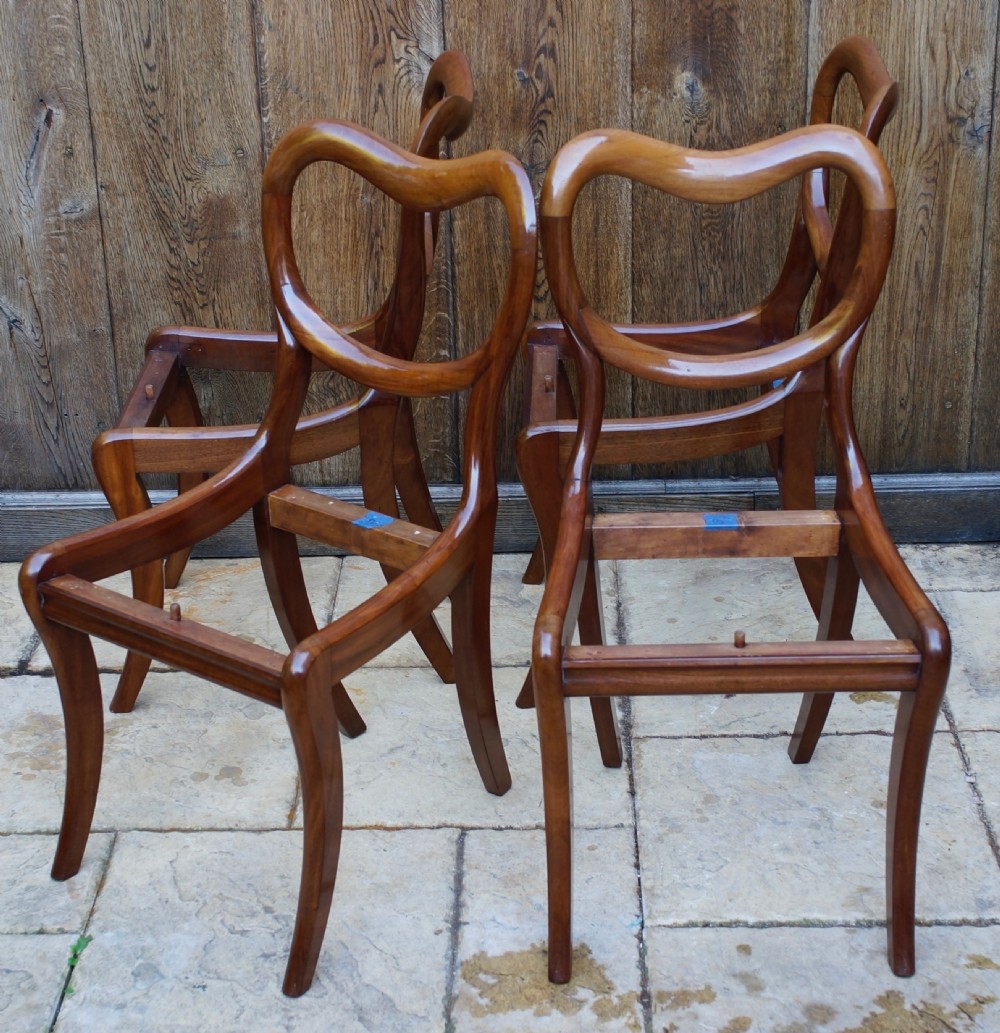 Set of 4 1830s solid mahogany sabre legged dining chairs with kidney shaped backs. View V