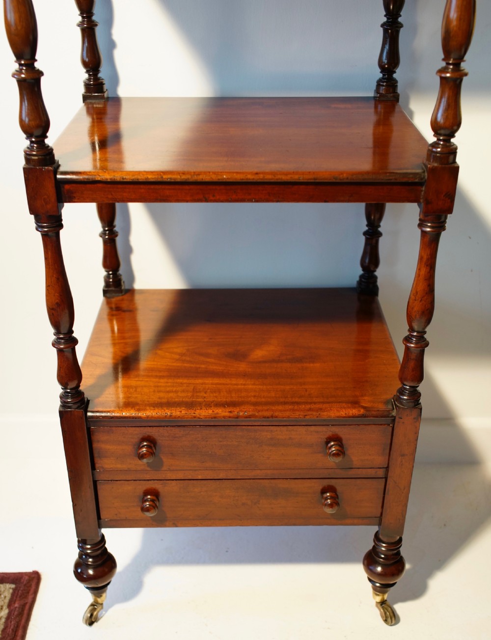 Handsome tall mahogany Whatnot with two drawers raised on turned feet View V
