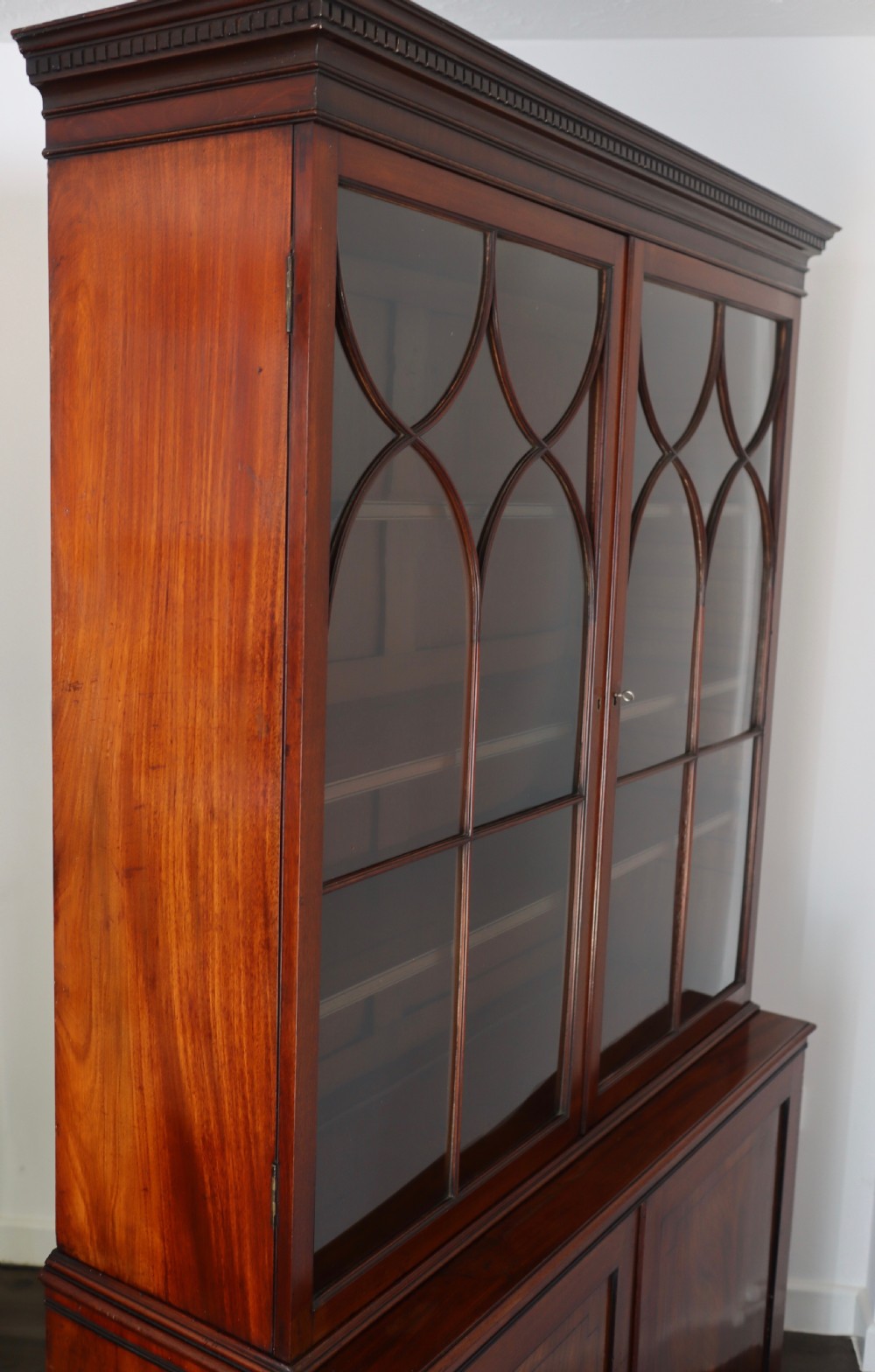 Georgian mahogany and ebony inlaid cupboard bookcase circa 1810 View VI