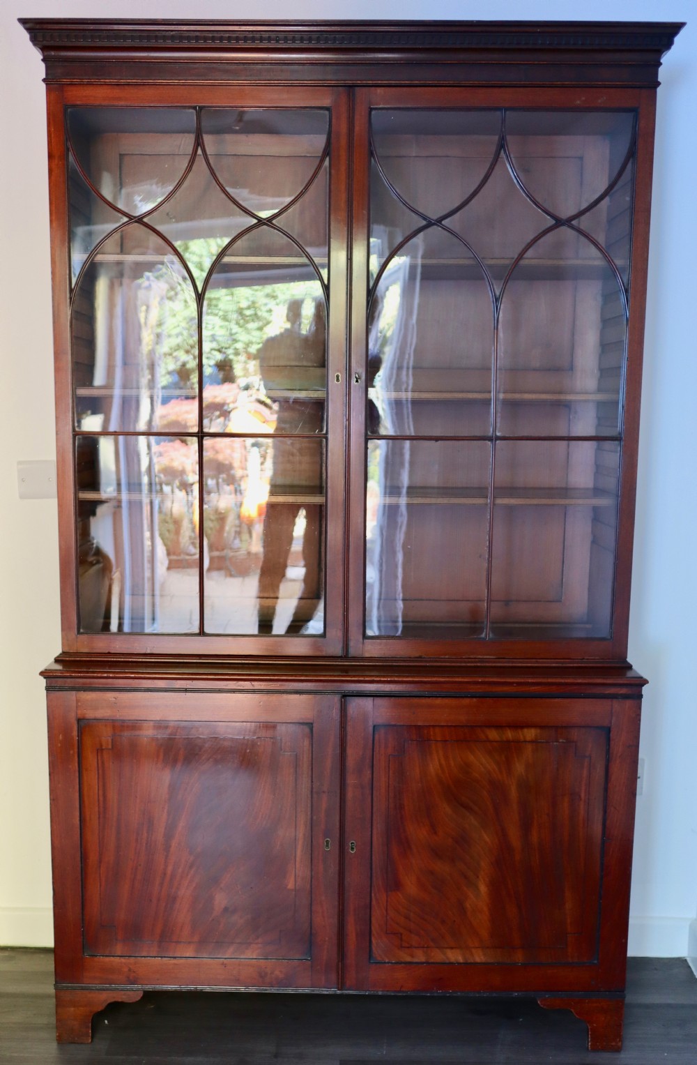 Georgian mahogany and ebony inlaid cupboard bookcase circa 1810