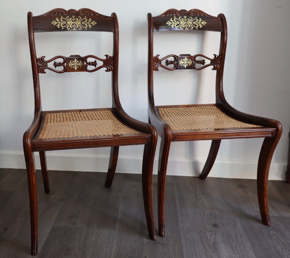 Pair of regency rosewood brass inlaid sabre leg chairs  View III