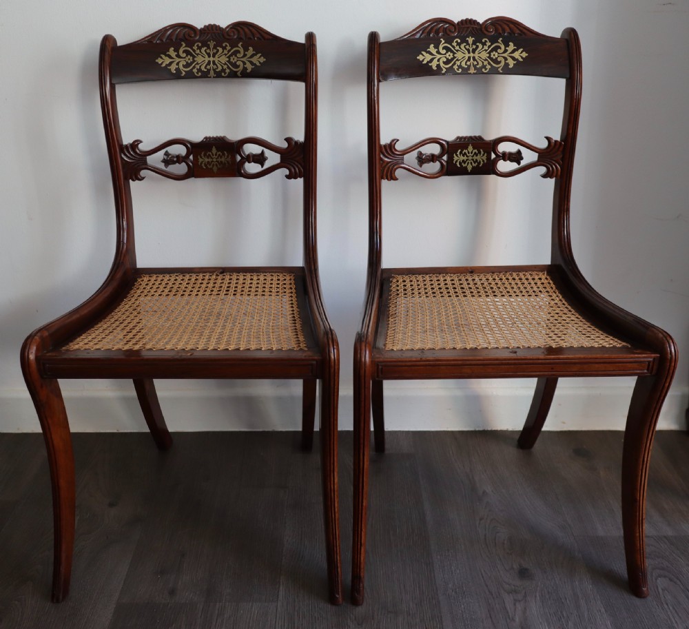 Pair of regency rosewood brass inlaid sabre leg chairs  View IV