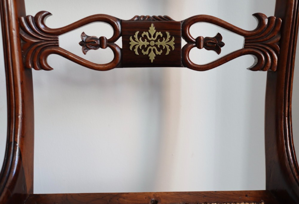Pair of regency rosewood brass inlaid sabre leg chairs  View VI