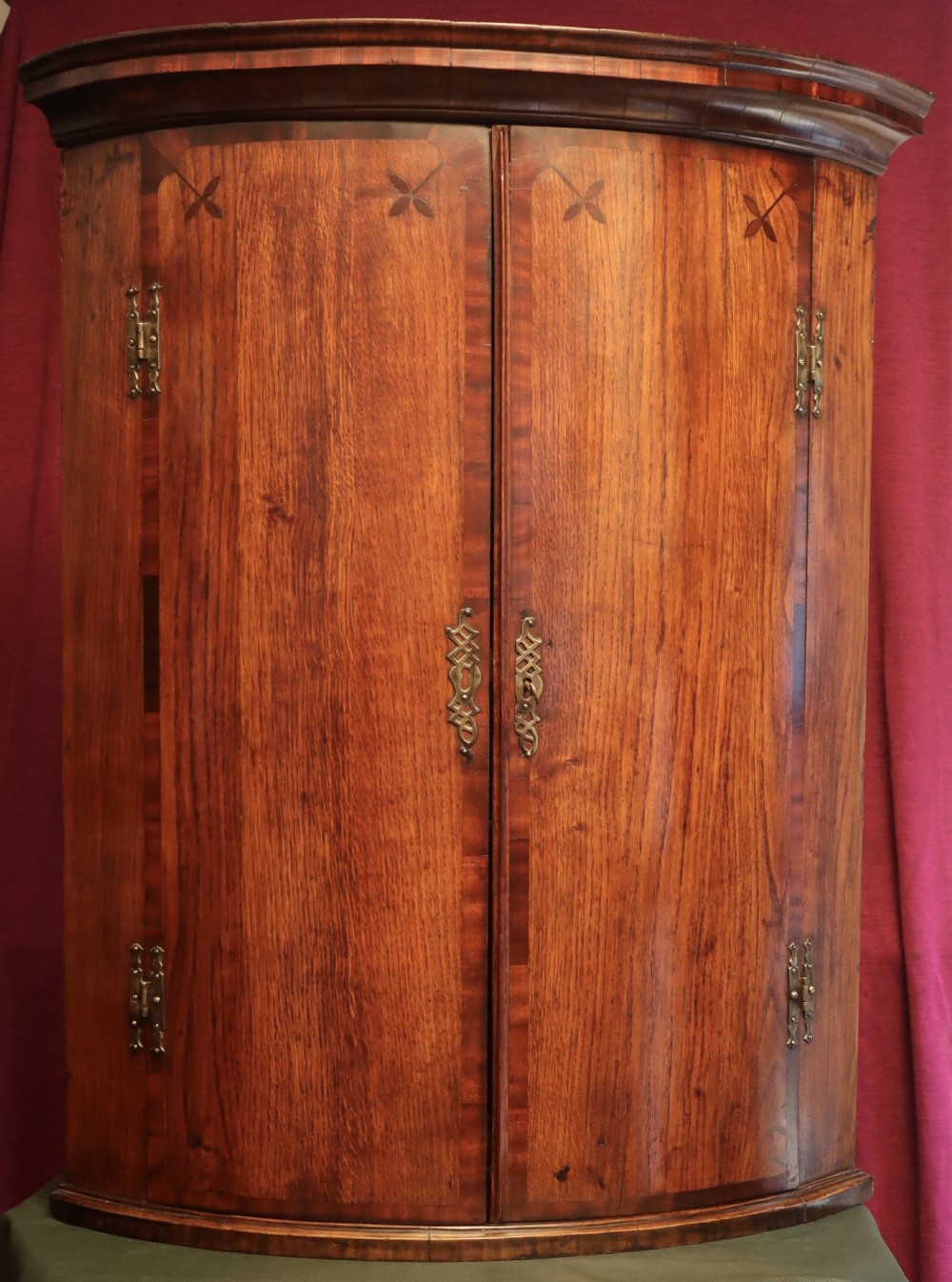 Antique oak and mahogany corner cupboard