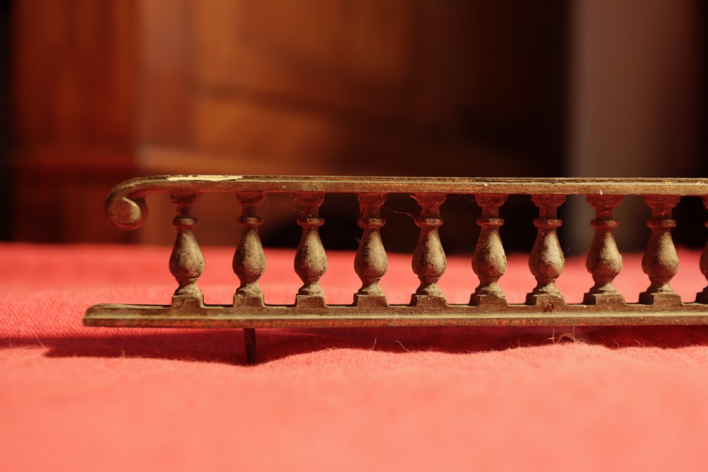 A pair of sectioned antique brass gallery rails featuring pierced fretwork designed for furniture edging. View V