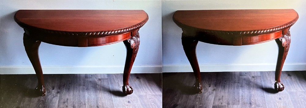 A circular mahogany antique extending dining table featuring carved cabriole legs with ball and claw feet and a rope-carved rim edge. View VI