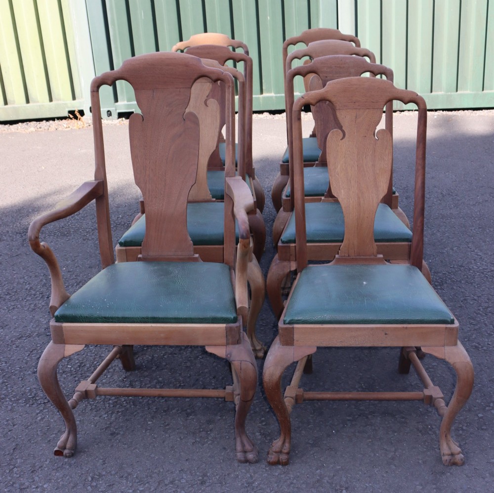 Set of eight dining chairs.