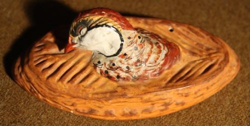 A Victorian terracotta game pie dish featuring a fluted base and a sculpted cover topped with a painted game bird head. View V