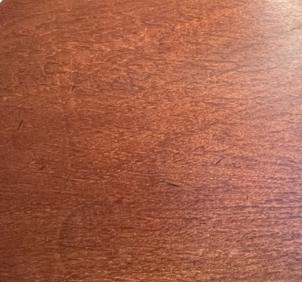 A mahogany tilt-top tripod table shown with its top positioned vertically, revealing a turned central column and cabriole legs. View II