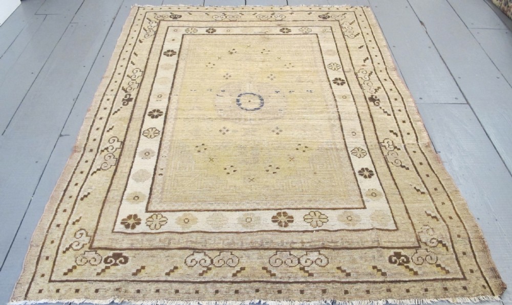 Fashionably Pale Antique Khotan Rug. East Turkestan, circa 1890, 1.95m x 1.43m