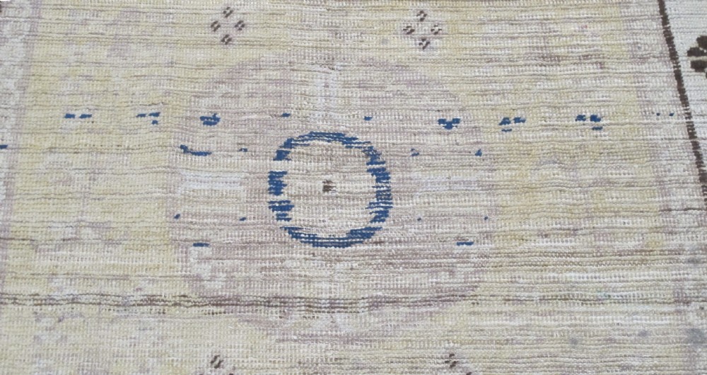 Fashionably Pale Antique Khotan Rug. East Turkestan, circa 1890, 1.95m x 1.43m View III