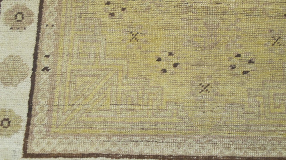 Fashionably Pale Antique Khotan Rug. East Turkestan, circa 1890, 1.95m x 1.43m View IV