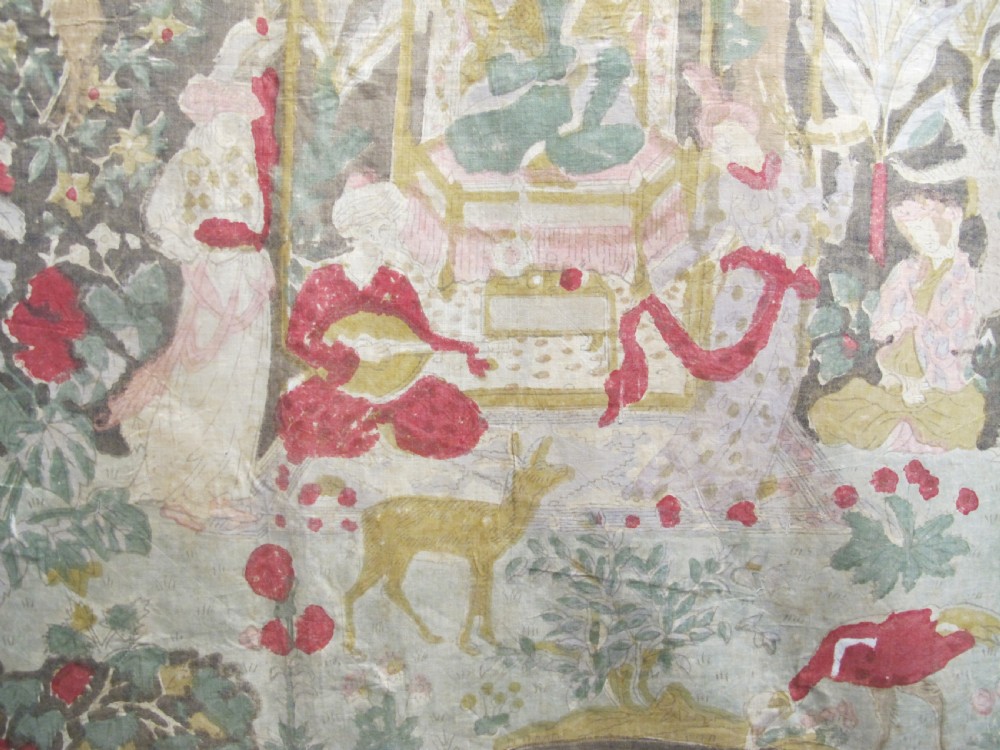 A rectangular 19th-century Persian Qajar block-printed and hand-painted cotton textile displaying cypress trees, garden pavilions, and seated figures within a wide decorative border. View V