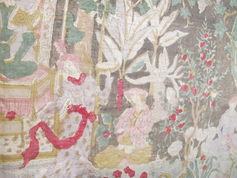 A rectangular 19th-century Persian Qajar block-printed and hand-painted cotton textile displaying cypress trees, garden pavilions, and seated figures within a wide decorative border. View VI