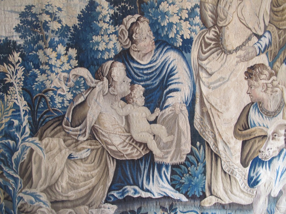 A large 17th-century woven Aubusson tapestry displaying a biblical scene with figures, hounds, and foliage in shades of blue, cream, and green. View II