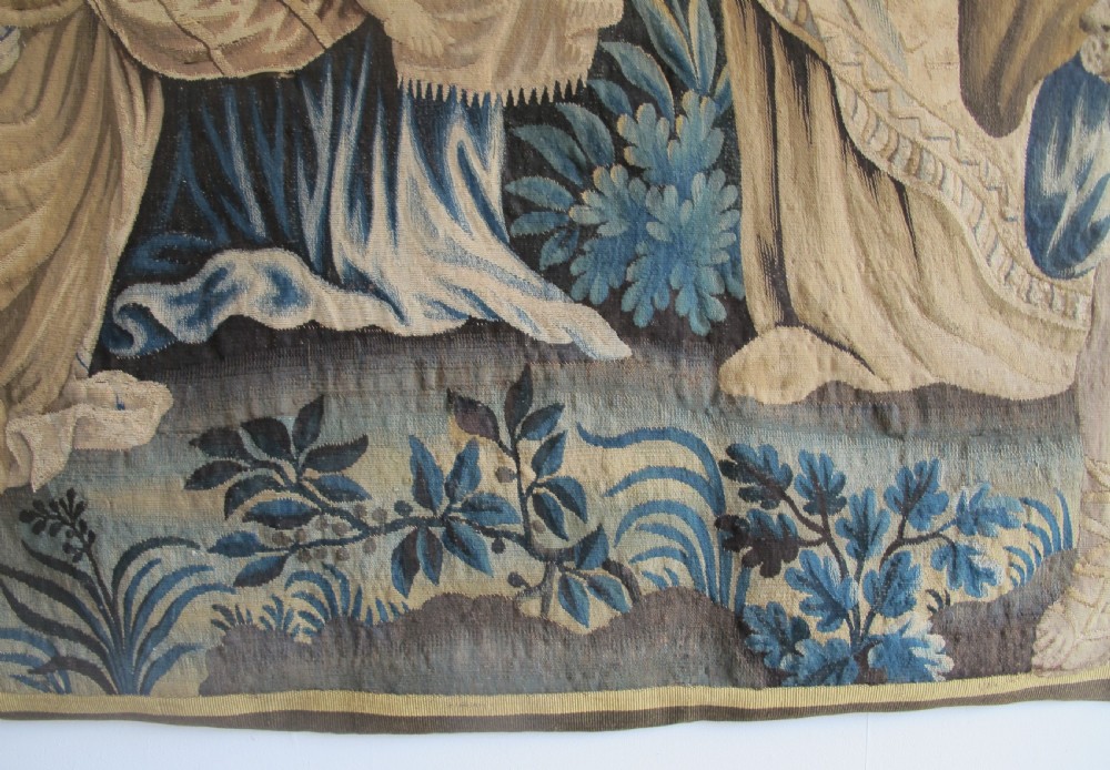A large 17th-century woven Aubusson tapestry displaying a biblical scene with figures, hounds, and foliage in shades of blue, cream, and green. View XIV