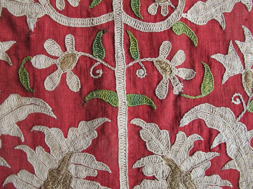 A long, narrow 19th-century Ottoman textile fragment featuring intricate gold botanical embroidery on a vibrant red background. View VIII