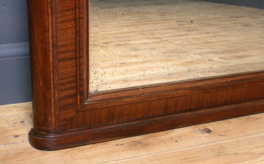 A tall rectangular French walnut wall mirror featuring an inset oil painting of a landscape above a large rectangular glass pane. View VI