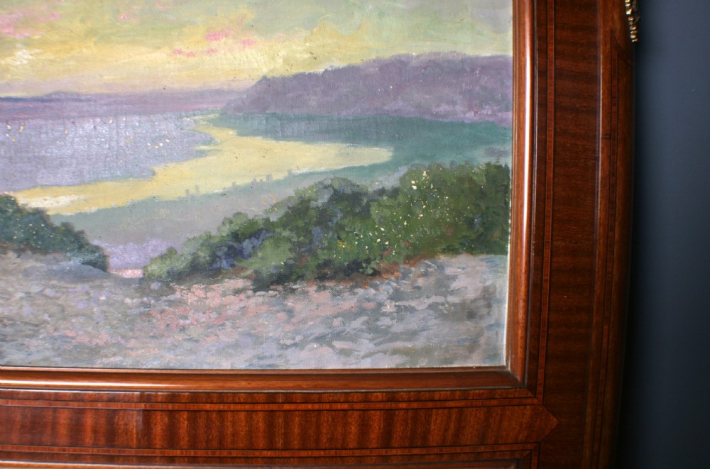 A tall rectangular French walnut wall mirror featuring an inset oil painting of a landscape above a large rectangular glass pane. View X