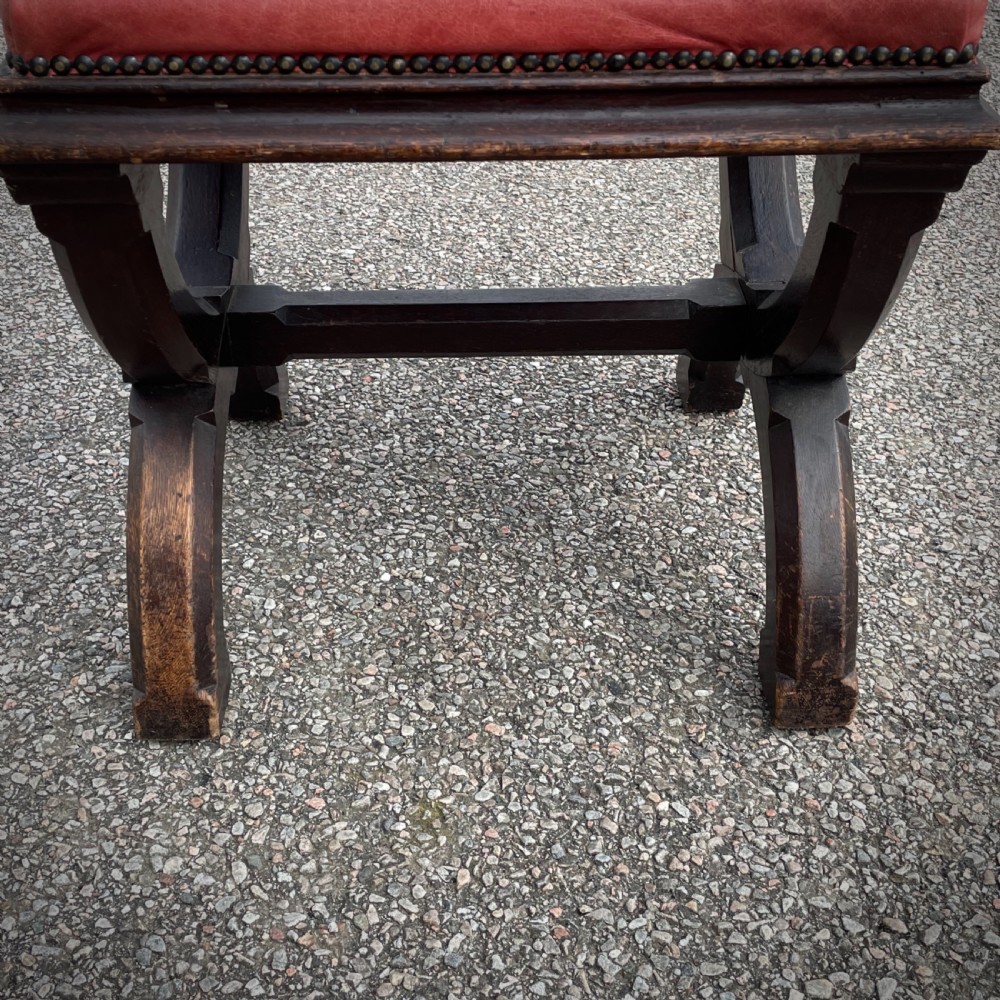 Attractive Antique Gothic Style Leather Chair With X Frame Legs View VIII
