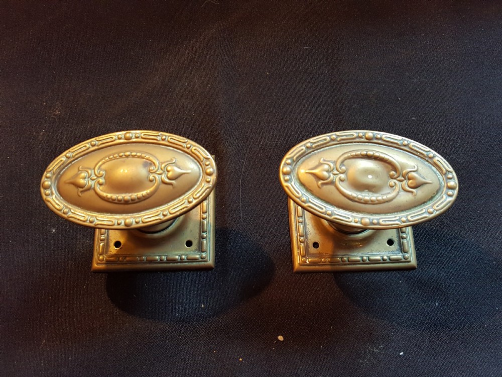 One Pair of Regency Brass Door Knobs. View V