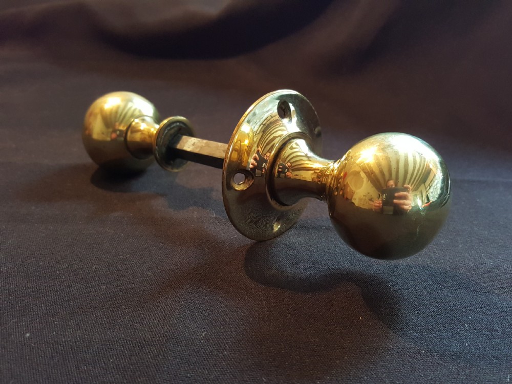 One Pair of Edwardian Brass Rim-Lock Door Knobs.