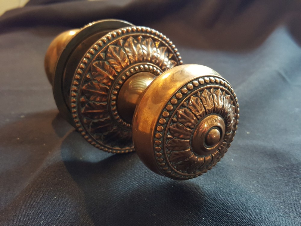 One Pair of Regency Bronze Door Knobs.