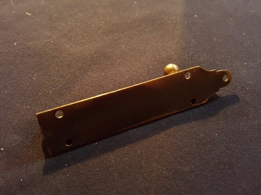 One Victorian Brass Bolt with Keep. View V