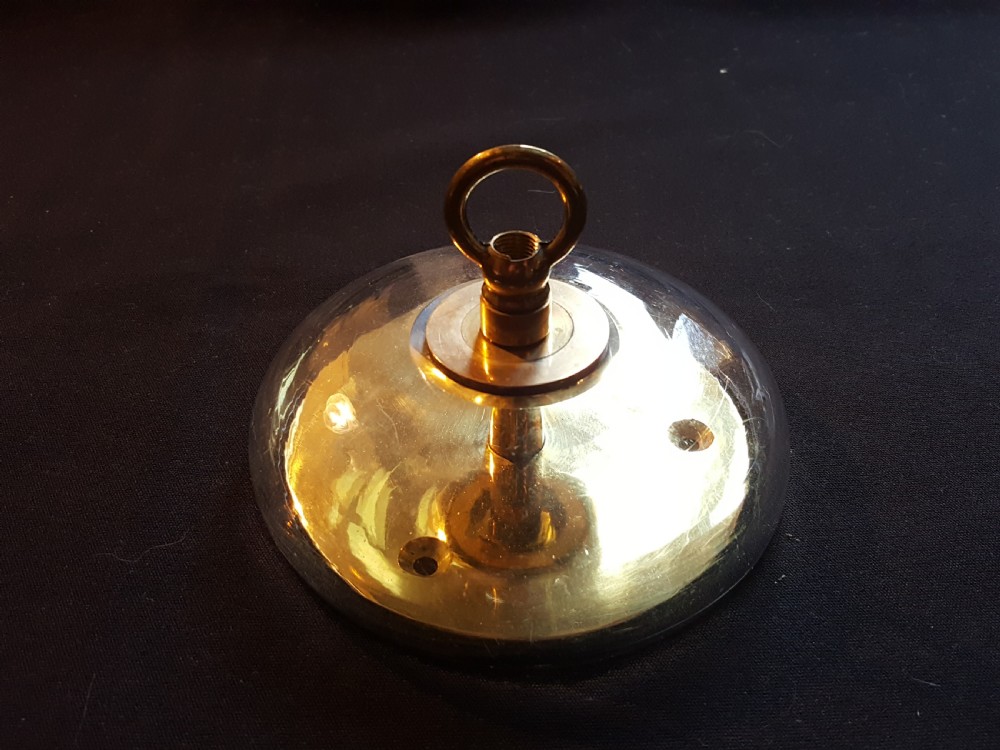 A pair of Victorian clear glass ceiling roses featuring central brass mounting hooks and diamond cut glass detailing. View IV