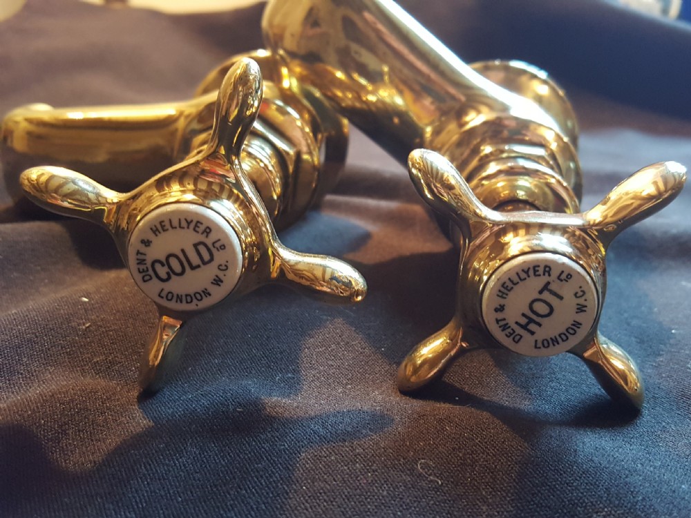 A pair of restored Victorian polished brass bath taps featuring crosshead handles and threaded tails. View II