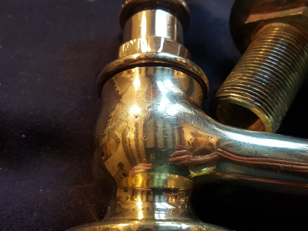 A pair of restored Victorian polished brass bath taps featuring crosshead handles and threaded tails. View V