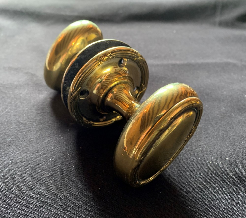 One Pair of Brass Regency Oval Door Knobs. View VII